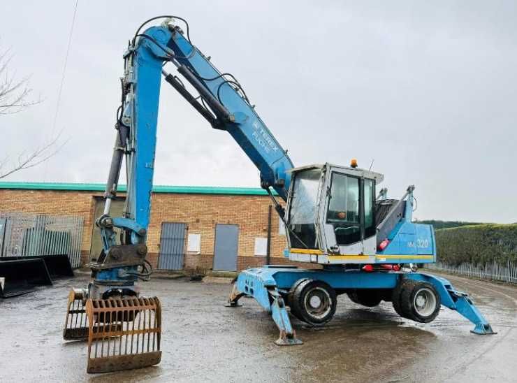 Екскаватор для перевалки лісу , металолома FUCHS MHL 320