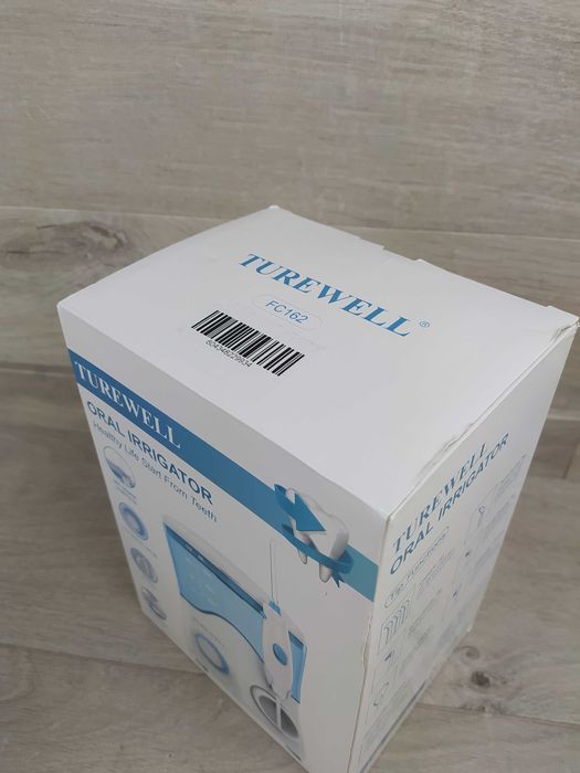 TUREWELL FC162 Elektryczny irygator do jamy ustnej OPIS