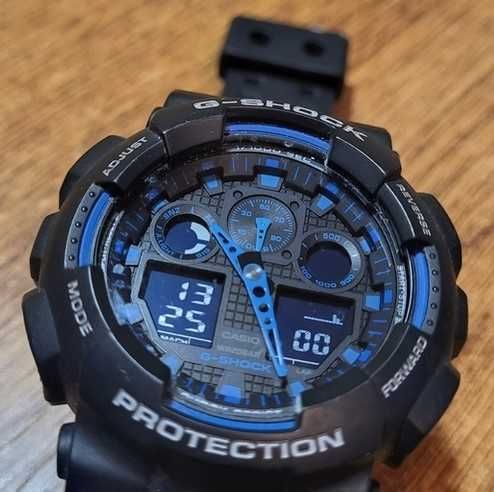 Casio G-Shock GA 100-1A2ER
Black/ Blue как новые