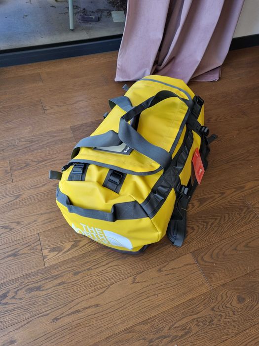 Torba podróżna The North Face Base Camp Duffel S - summit gold 50 l