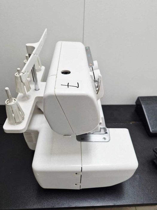Оверлок Janome 210d