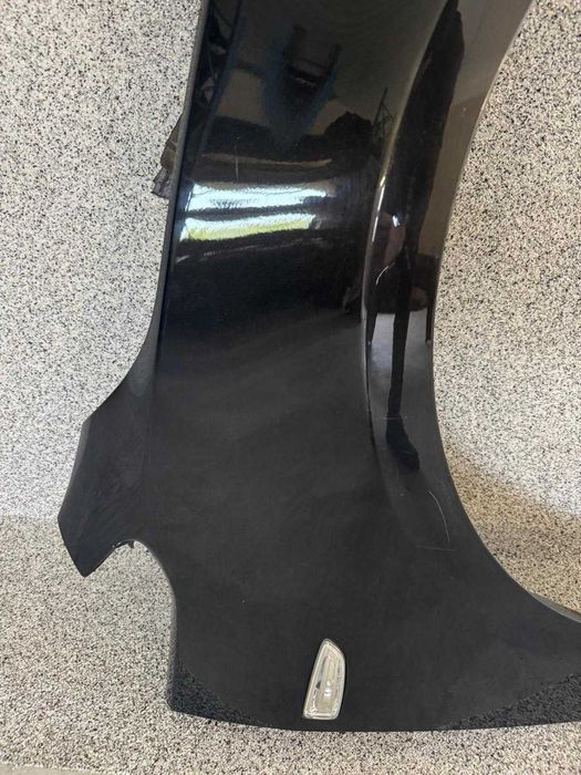 Błotnik prawy przód Opel Astra J Z190