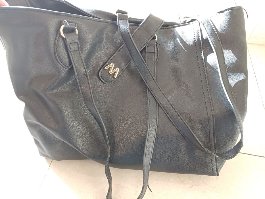 Mala de senhora Misako usada duas vezes