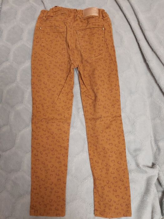 Spodnie jeansy rude panterka r. 128