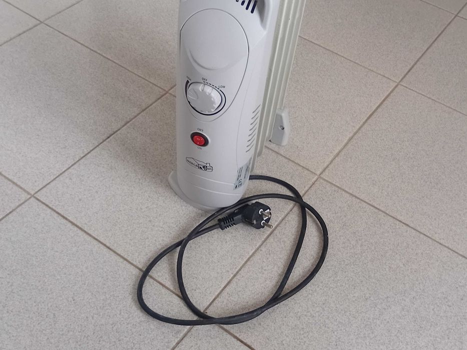 Mini radiador a óleo