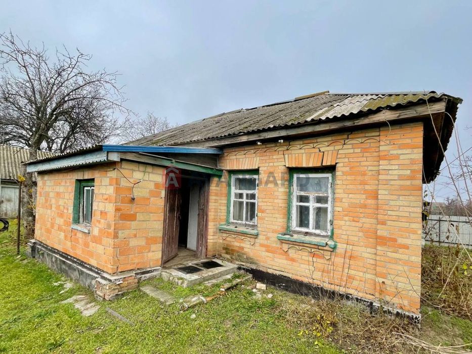 Ділянка 25 сотих з будинком в с. Худяки