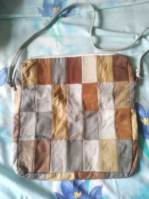 Продам сумку кожаную.Кооляску детскую.