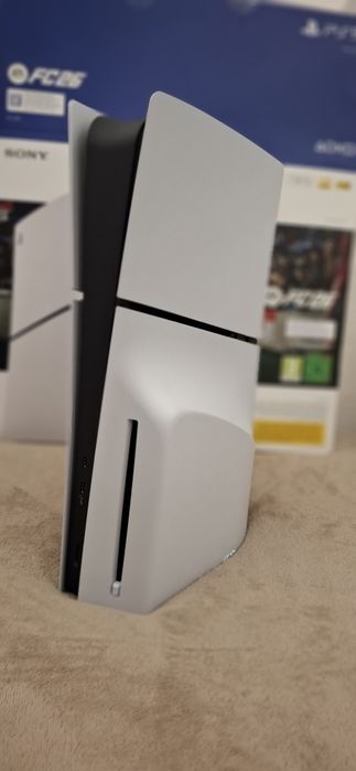 Ps5 slim 1TB c/leitor dvd+2 comandos+2 jogos+headset+dok+grip+garantia