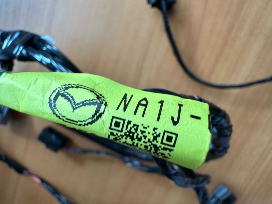 Проводка заднього бамперу Mazda NA1J-67-290A нова, оригінальна.