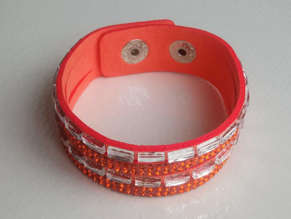 Bransoletka na pasku z kryształkami z cyrkoniami pomarańczowa 17 18 19 cm