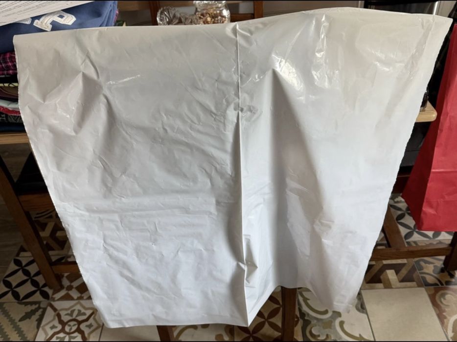 Fartuchy plastikowe długie z trokami nowe