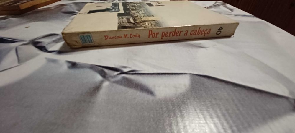 Livro _Por Perder a Cabeça_ de Duncan M. Cody