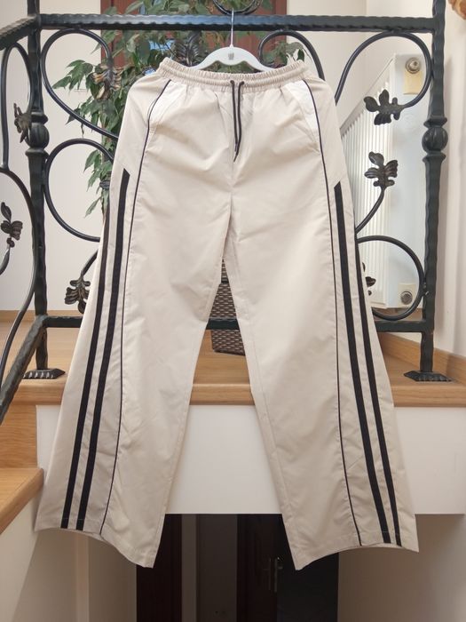 Bezowe spodnie straight Cropp rozm.34