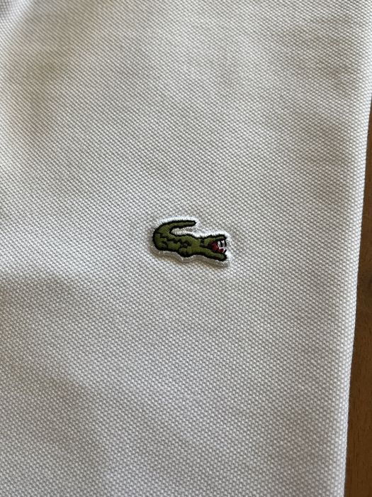 Polo Lacoste Branco64584489974274121