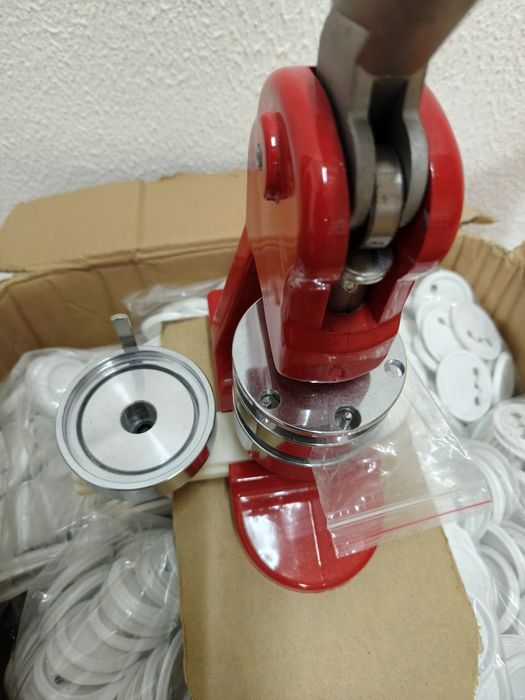 Máquina de crachás ou pins