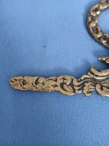 Stare mosiezne zakonczenie do lampy zegara