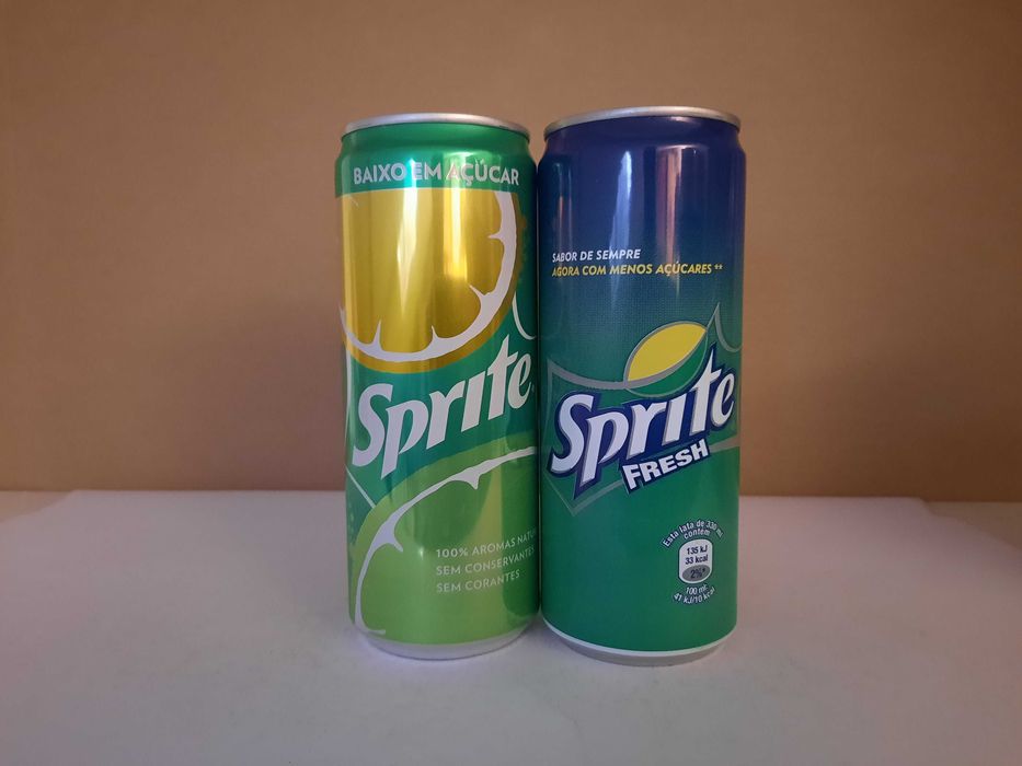 lote de 58 latas de bebidas diversas - Sprite, Snappy, Aquarius