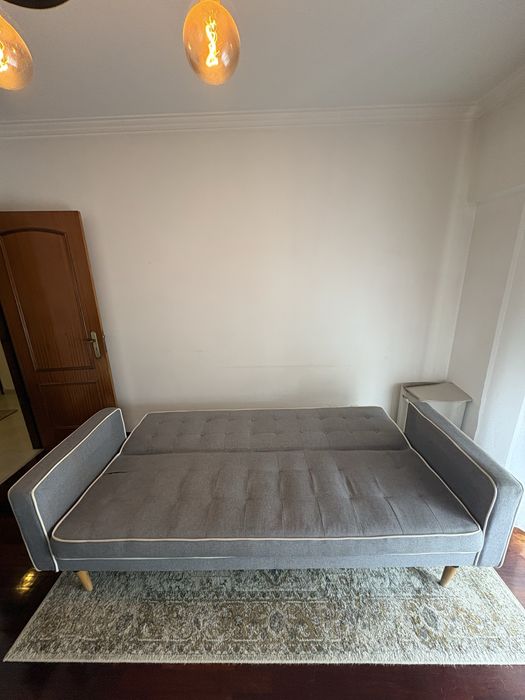 Sofá-cama cinzento