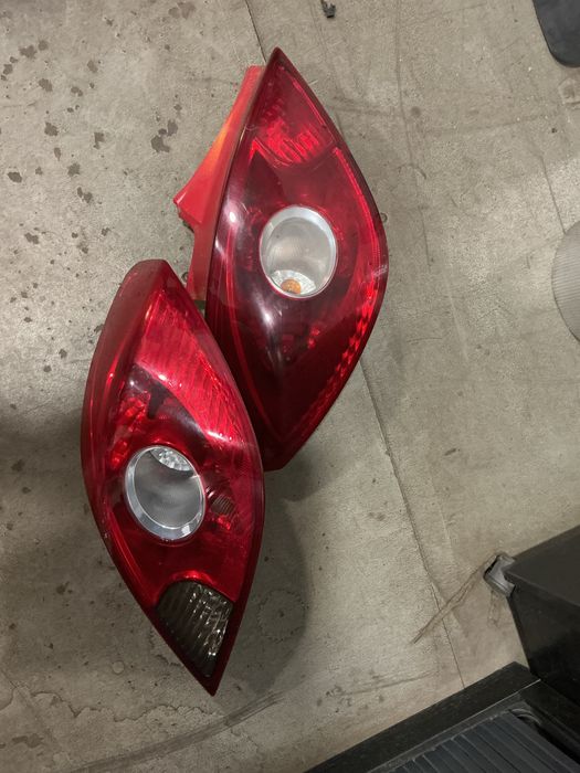 FAROLIM TRASEIRO DIREITO/ESQUERDO OPEL CORSA D ANO 2007