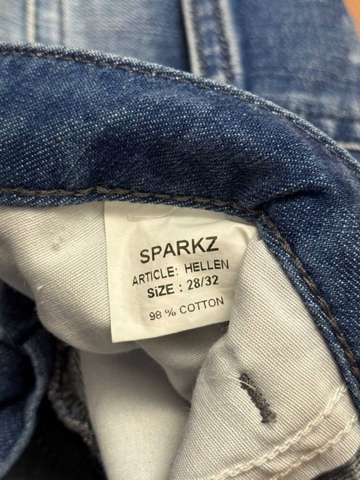 Spodnie jeansowe z dziurami rozdarciami jeansy Sparkz W28 L32 S