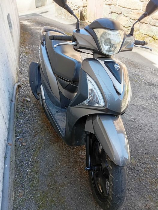 Moto 125 bem estimada troco por carro Ismart do mesmo valor..