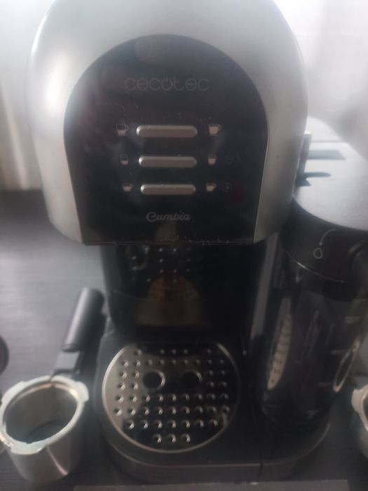 Máquina de cafe manual e capsulas