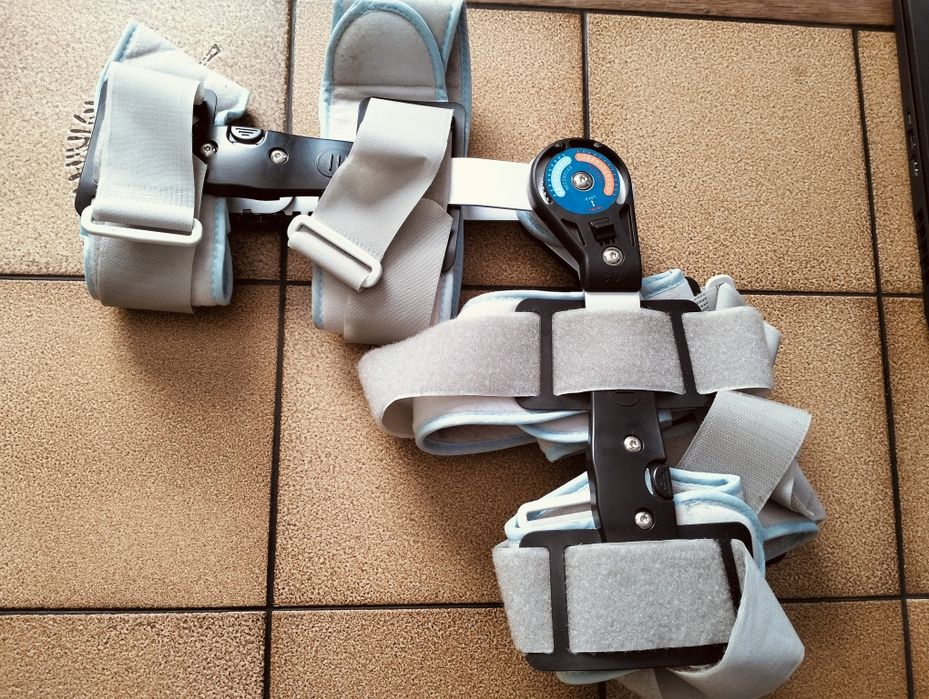 Orteza pooperacyjna stawu kolanowego stabilizator na goleń i udo