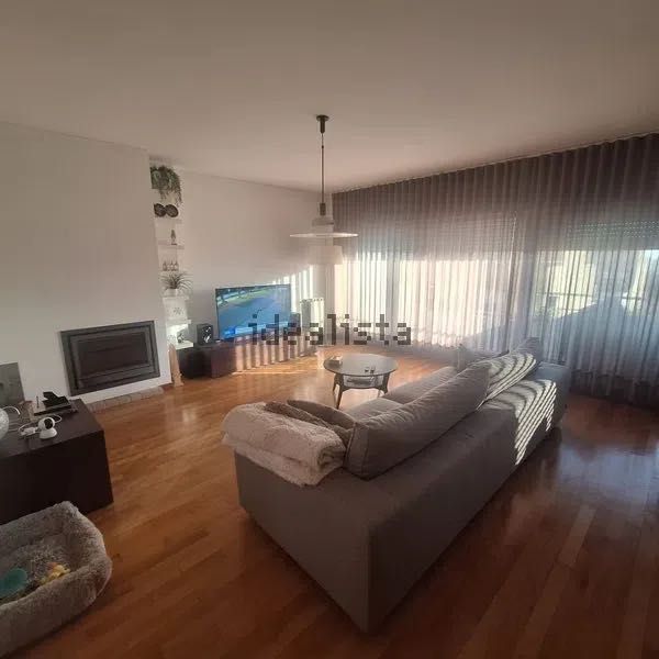 Sofá cinzento tecido