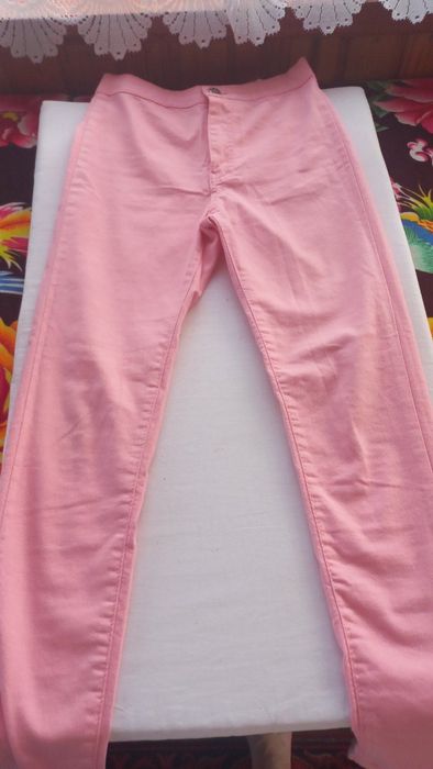 Рожеві джинсові штани