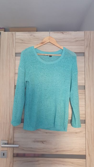 Ażurowy miętowy sweter