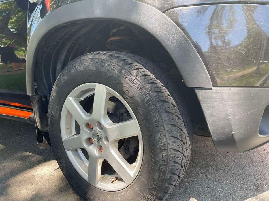 Dacia Duster 2008-2018 рр. Накладки на арки (4 шт., чорні ABS)