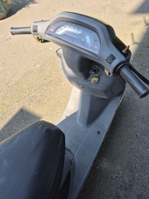 Скутер Honda Tact.