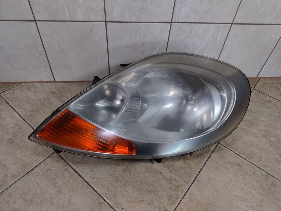 Renault Trafic Opel Vivaro 2 II lift 06-14 lampa przednia lewa Europa