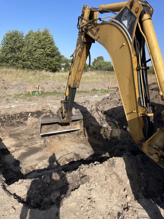 Usługi koparko-ładowarką budowlane koparką kołową transport