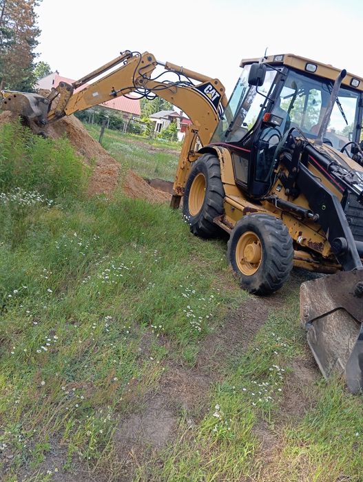 Usługi Koparko-ładowarką (CAT 428D)