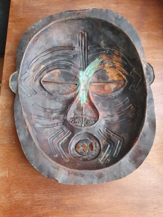 Máscara em cobre tons de laranja