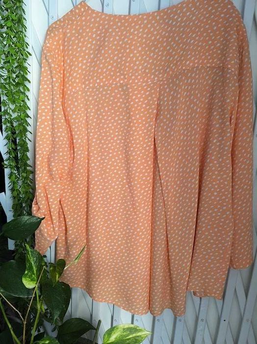 Blusa com modelagem fluída e jovial que dentro da sua simplicidade transita para um look casual - Tam - XXL    Modalfa