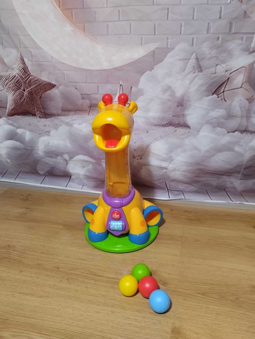 Zabawka edukacyjna Bright Starts Spin & Giggle Giraffe żyrafa fontanna