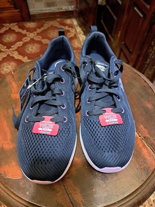 Продам кросівки жіночі сині