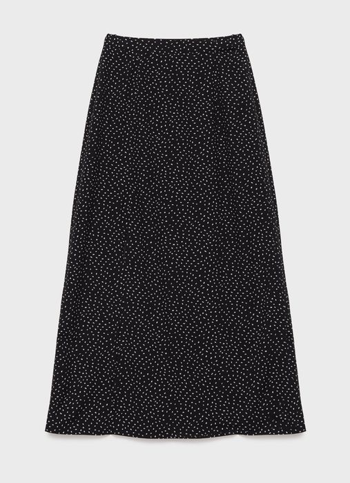 Легка чорна спідниця в горошок правильної довжини
