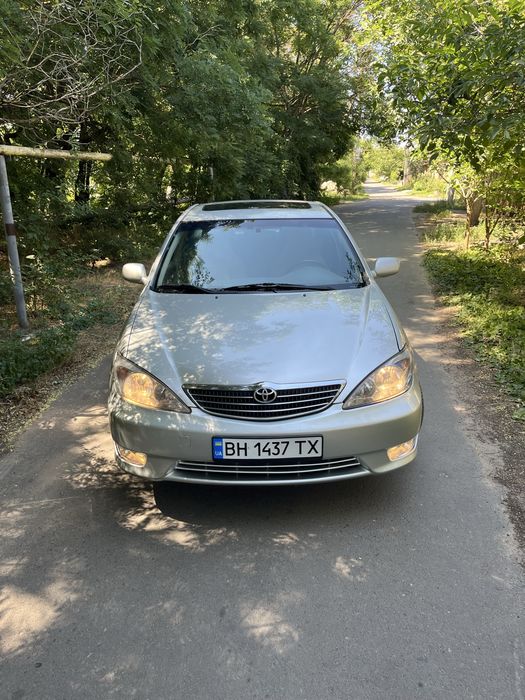 Камри 30, 2.4 газ/бензин на автомате.