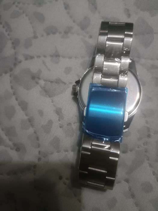 Relógio de homem novo em caixa