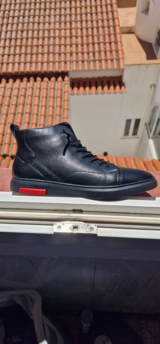 Botas em pele - pretas