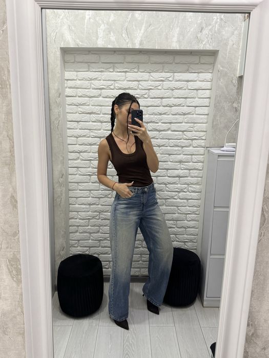 Джинси широкі труби bershka