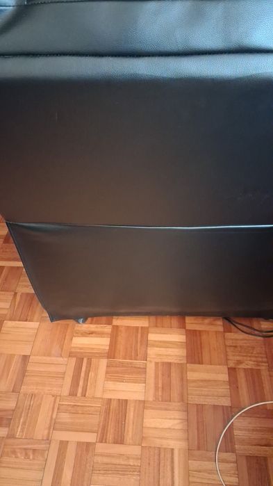 Sofá eletrico preto de pele sintetica