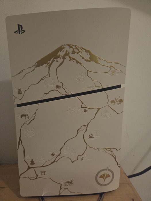 Vendo ps5 slim com 4 jogos e 1 comando , edição Ghost of Yotei