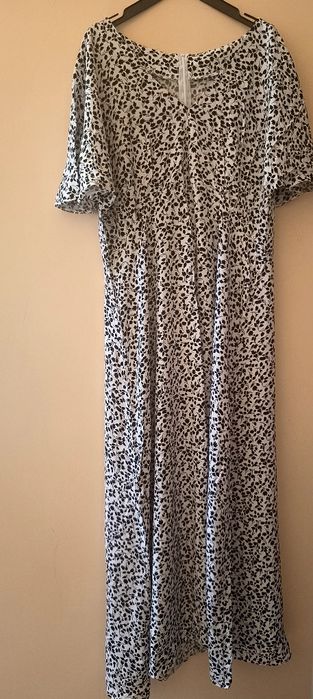 Дога жіноча сукня