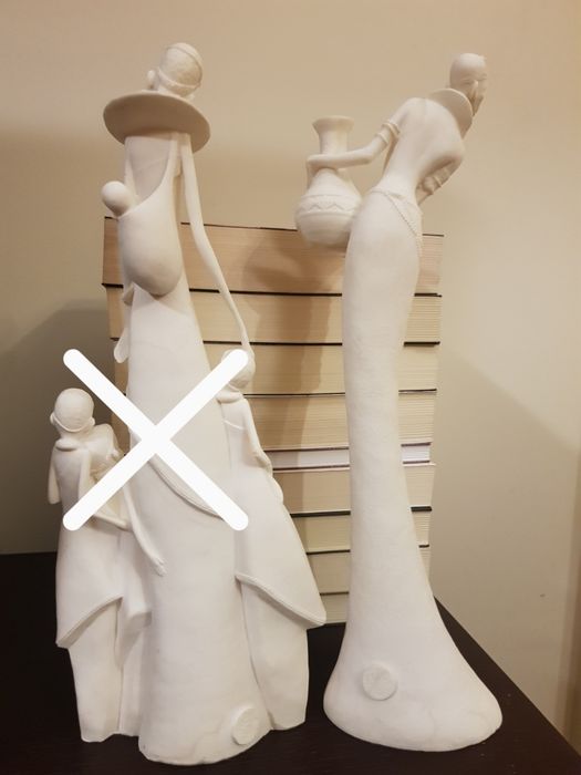 1 estatueta marfinite