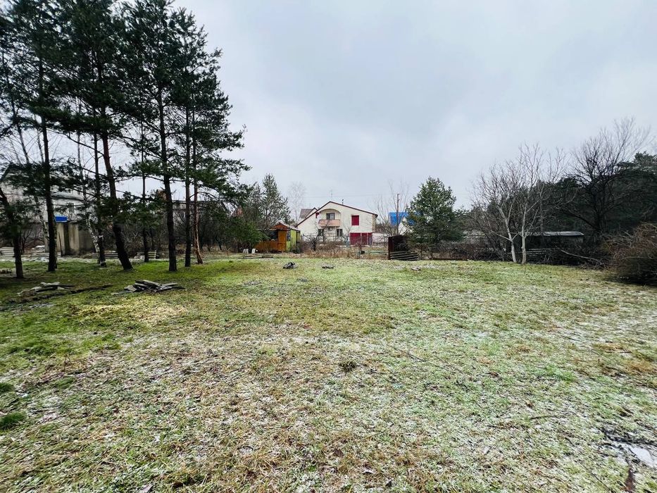 Продам участок в Обуховке,сосновый лес,река пляж закрытая территория