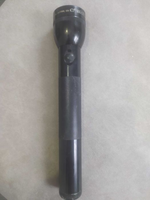 Фонарь-дубінка поліцейській!